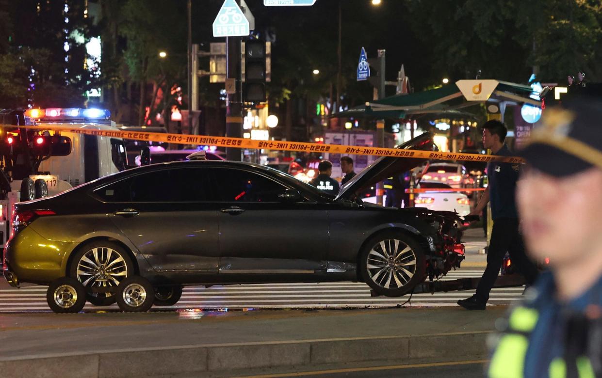 The car rammed into pedestrians in Seoul, according to local reports