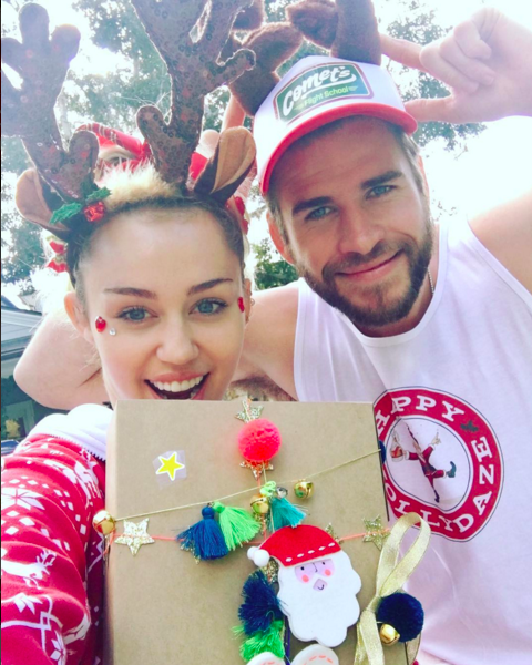 <p>Miley Cyrus brings out Liam Hemsworth’s silly — and crafty — side! “Happy Hollydaze!” she captioned this snap of her and her beau on Christmas Day wearing antlers and posing with a present wrapped by Hemsworth. She proudly added the hashtag, #bestpresentwrappereva. (Photo: <a rel="nofollow noopener" href="https://www.instagram.com/p/BOc-VuyBuUJ/" target="_blank" data-ylk="slk:Instagram;elm:context_link;itc:0" class="link ">Instagram</a>) </p>