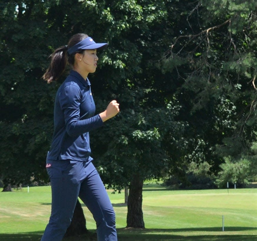 Xiaowen Yin pumps her fist after making a putt on the first playoff hole. Yin would go on and win the FireKeepers Casino Hotel Championship at Battle Creek Country Club on Sunday.