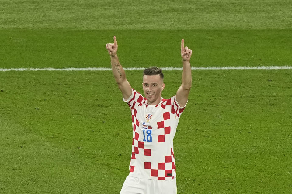 Croatia's Mislav Orsic celebrates after scoring his side's second goal during the World Cup third-place playoff soccer match between Croatia and Morocco at Khalifa International Stadium in Doha, Qatar, Saturday, Dec. 17, 2022. (AP Photo/Martin Meissner)
