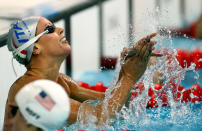 BEIJING - AUGUST 11: Federica Pellegrini of Italy celebrates finishing the Women's 200m Freestyle Heat 6 in first place held at the National Aquatics Center on Day 3 of the Beijing 2008 Olympic Games on August 11, 2008 in Beijing, China. Federica Pellegrini of Italy finished the race in a time of 1.55.45 a new World Record. (Photo by Adam Pretty/Getty Images)