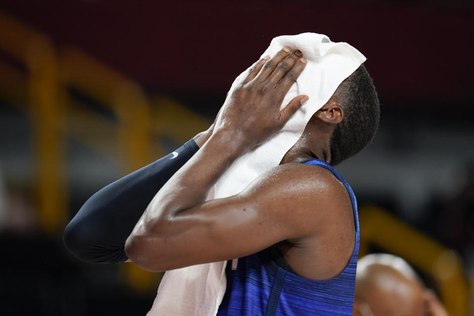 United States' Bam Adebayo reacts at the end of a men's basketball preliminary round game against France at the 2020 Summer Olympics, Sunday, July 25, 2021, in Saitama, Japan. France won 83-76. (AP Photo/Charlie Neibergall)