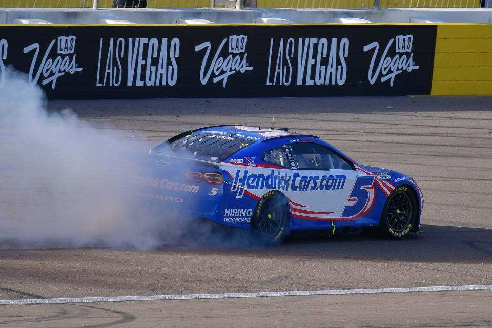 Mar 3, 2024; Las Vegas, Nevada, USA; NASCAR Cup Series driver Kyle Larson (5) celebrates his victory of the Pennzoil 400 at Las Vegas Motor Speedway. Mandatory Credit: Gary A. Vasquez-USA TODAY Sports