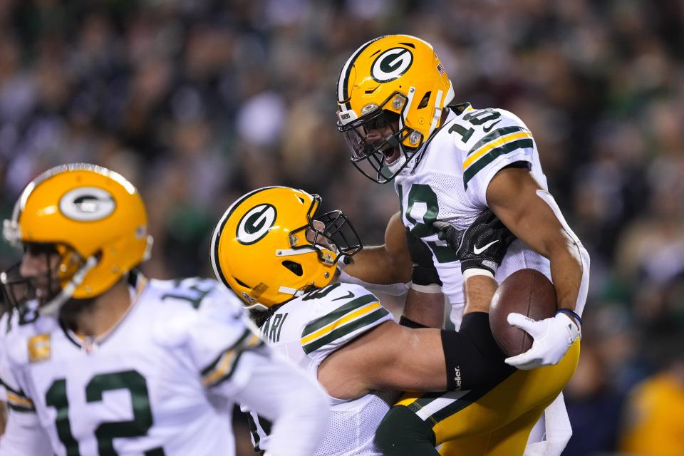 Green Bay Packers' Randall Cobb (18) celebrates a touchdown with David Bakhtiari during the first half of an NFL football game against the Philadelphia Eagles, Sunday, Nov. 27, 2022, in Philadelphia. (AP Photo/Matt Rourke)