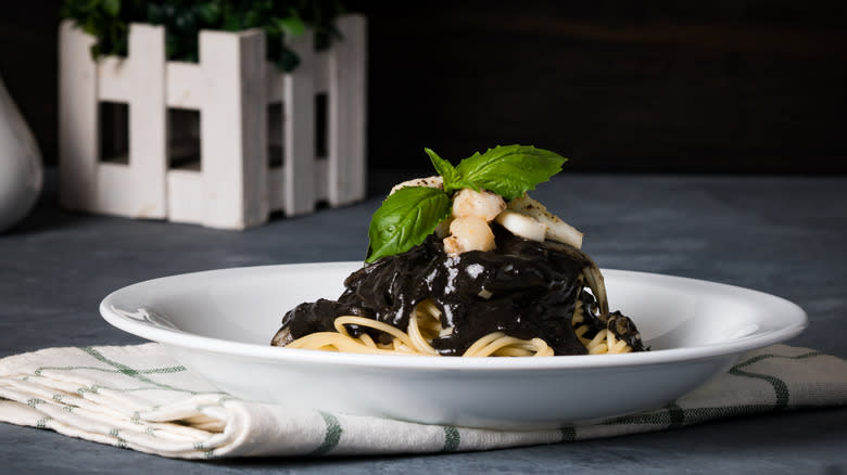 Squid ink pasta on a plate