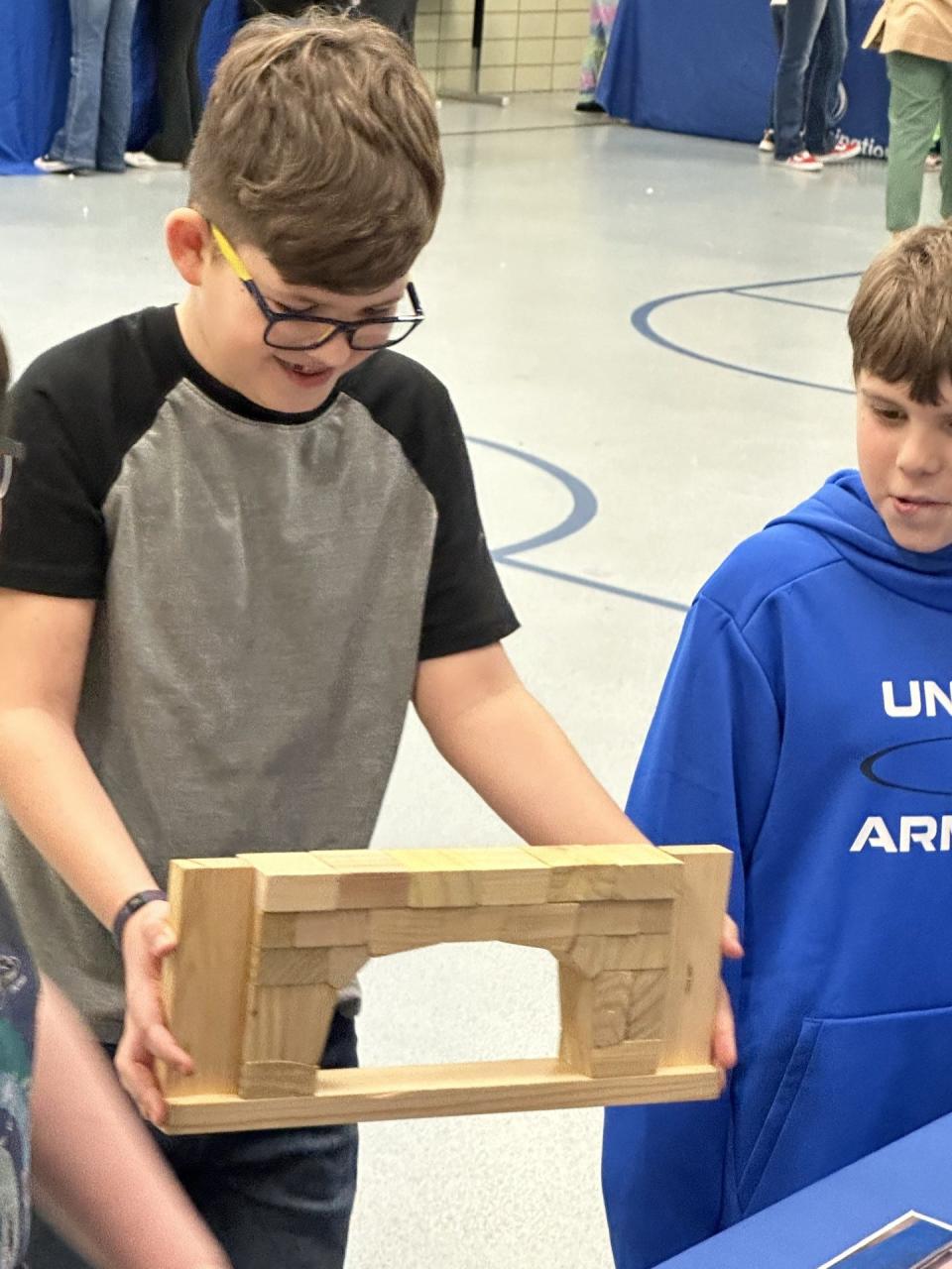 Eyler students (from left) Cameron Quednau and Kirk Pellad show their structure.