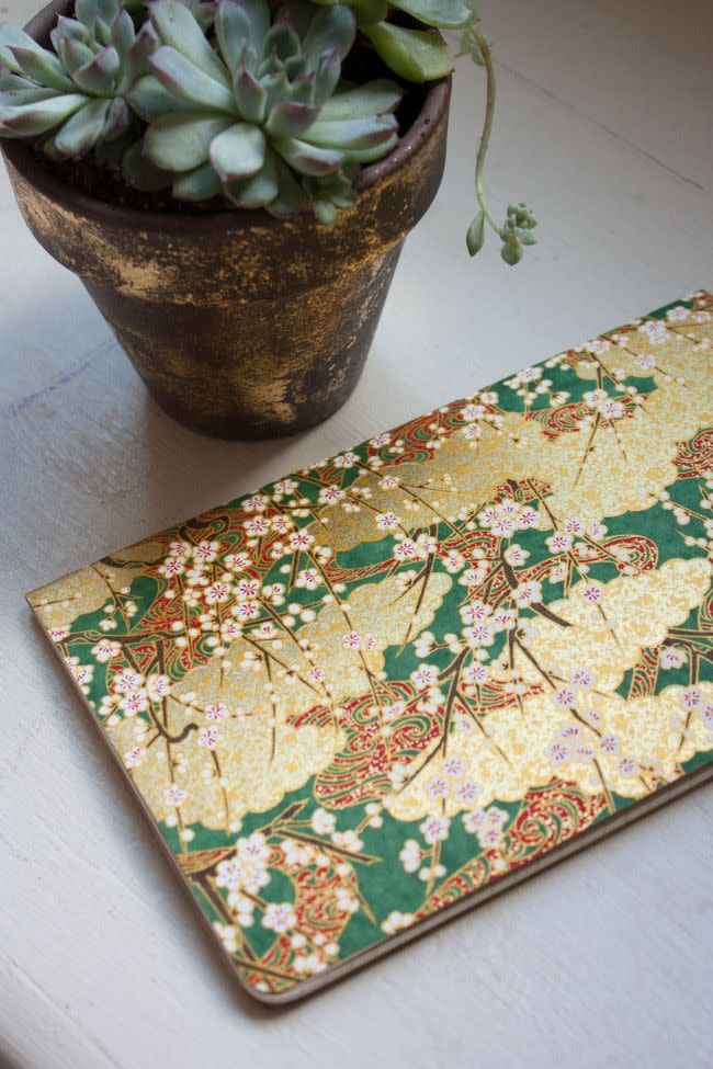 <p>If you don't want to spend money on a cute notebook, wrap a plain notebook with origami paper to create a treasured journal. </p><p><em><a href="http://thesarahjohnson.com/2015/03/17/how-to-patterned-notebook/" rel="nofollow noopener" target="_blank" data-ylk="slk:Get the tutorial at Sarah Johnson »;elm:context_link;itc:0;sec:content-canvas" class="link ">Get the tutorial at Sarah Johnson »</a></em> </p>