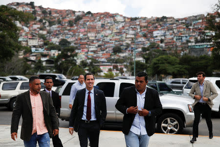 Venezuelan opposition leader Juan Guaido arrives to attend a meeting with representatives of FEDEAGRO, the Confederation of Associations of Agricultural Producers of Venezuela, in Caracas, Venezuela February 6, 2019. REUTERS/Carlos Garcia Rawlins