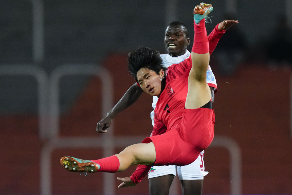 South Korea's Kim Yong-hak falls during a FIFA U-20 World Cup Group F soccer match against Gambia at the Malvinas Argentinas stadium in Mendoza, Argentina, Sunday, May 28, 2023. (AP Photo/Natacha Pisarenko)