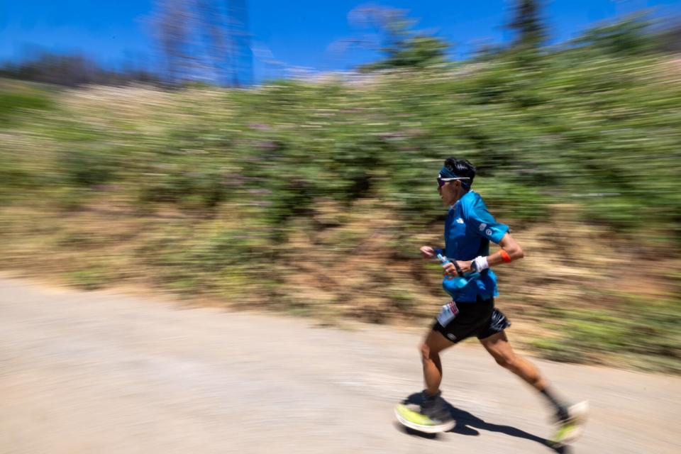 A runner heads west out of Michigan Bluff during competition.