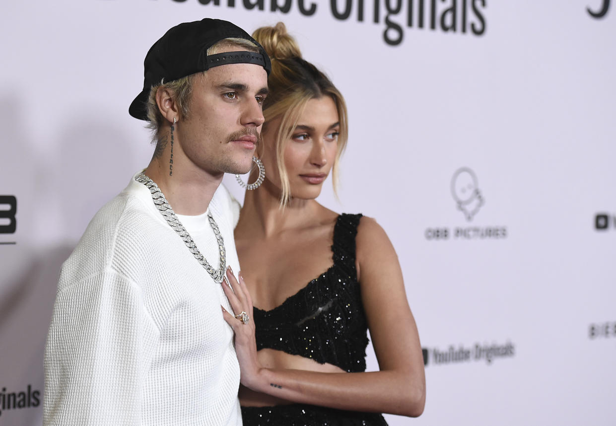 Justin Bieber and Hailey Baldwin arrive at the Los Angeles premiere of "Justin Bieber: Seasons" on Monday, Jan. 27, 2020. (Photo by Jordan Strauss/Invision/AP)