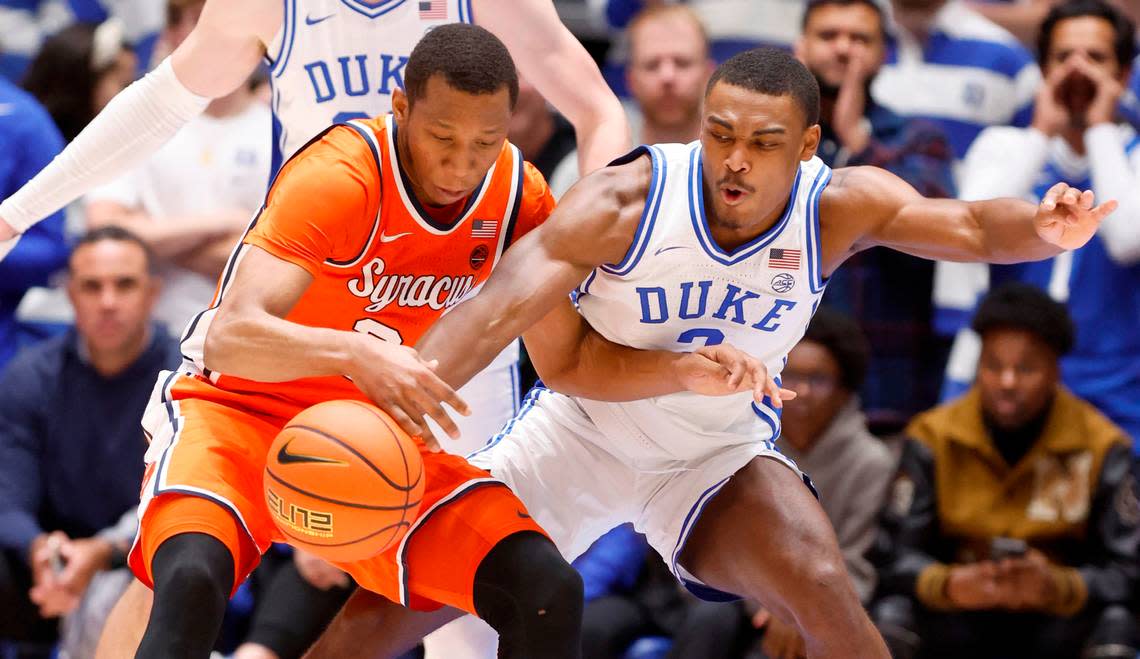 Duke’s Jaylen Blakes (2) knocks the ball from Syracuse’s Quadir Copeland (24) during the second half of Duke’s 86-66 victory over Syracuse at Cameron Indoor Stadium in Durham, N.C., Tuesday, Jan. 2, 2024.