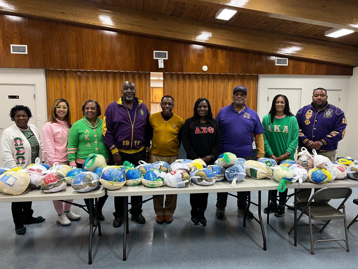 The Cleveland County Divine 9 Committee recently participated in a turkey giveaway.