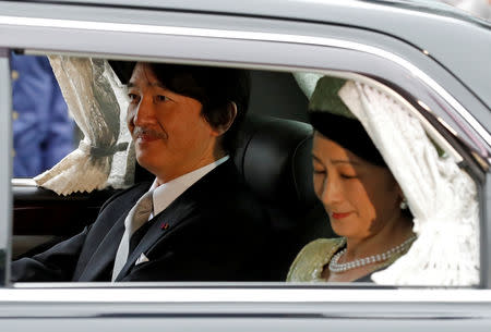 Japan's Prince Akishino and Princess Kiko arrive at the Imperial Palace, where Emperor Akihito will abdicate in a royal ceremony, in Tokyo, Japan, April 30, 2019. REUTERS/Kim Kyung-Hoon