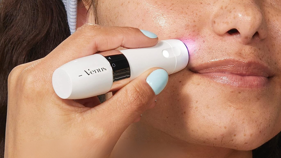 woman using mini Gillette Venus facial trimmer on her upper lip