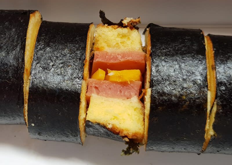 image of now bakery&#39;s sushi cake roll cross section