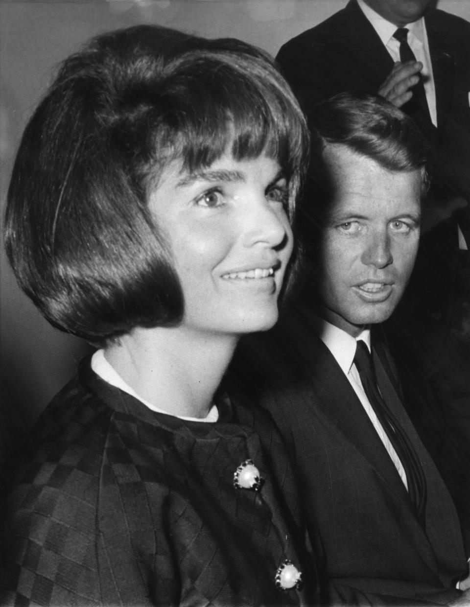 FILE - In this May 25, 1964 file photo, Mrs. Jacqueline Kennedy, wife of the late president, John F. Kennedy, talks to newsmen during a preview tour of the exhibit of the late President Kennedy's mementoes, in New York. At her side is U.S. Attorney General Robert Kennedy, brother of John F. Kennedy. Janis Hirsch's note, among some 800,000 sent to Mrs. Kennedy in the two months after President John F. Kennedy's Nov. 22, 1963, killing in Dallas, is featured along with about 20 others in "Letters to Jackie: Remembering President Kennedy," airing 9 p.m. EST Sunday, Nov. 17, 2013, on TLC. (AP Photo, File)
