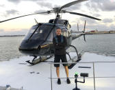 This undated photo provided by Group 3 Aviation shows helicopter pilot Ara Zobayan, who was at the controls of the helicopter that crashed in Southern California, Sunday, Jan. 26, 2020, killing all nine aboard including former Lakers star Kobe Bryant. Location is not provided. (Group 3 Aviation via AP)