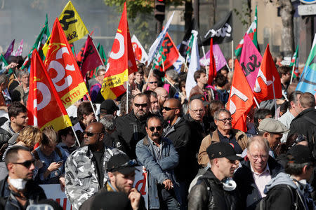 French CGT union leader Philippe Martinez (C) and protestors attends a demonstration against the government's labour reforms in Paris, France, September 21, 2017. REUTERS/Gonzalo Fuentes