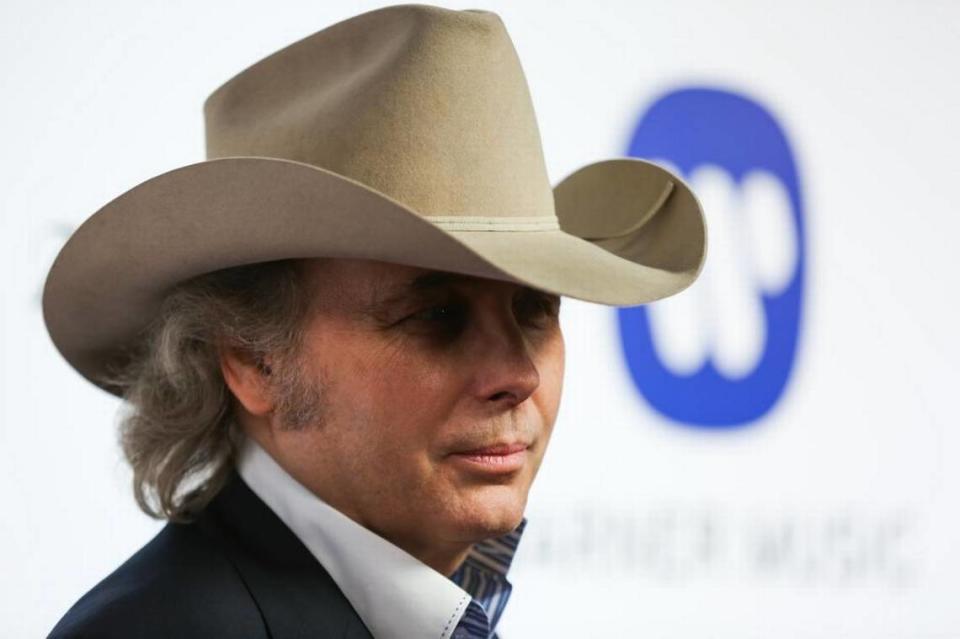Dwight Yoakum arrives at the Warner Music Group Grammy Awards After Party at Milk Studios on Monday, Feb. 15, 2016, in Los Angeles.