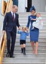 <p>Kate touched down in Canada for the first day of the 2016 royal tour wearing an elegant Jenny Packham dress, a matching blue maple leaf hat and suede Gianvito Rossi pumps. </p><p><i>[Photo: PA] </i></p>
