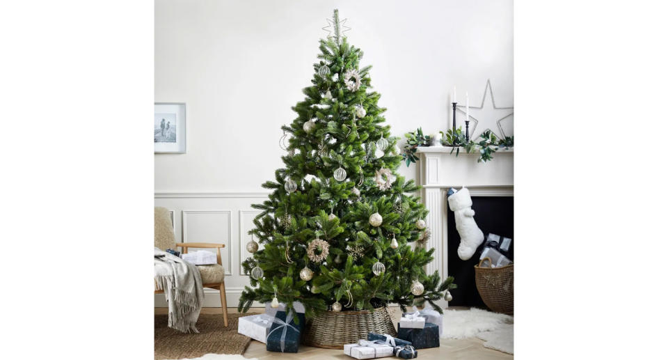 The wicker skirt makes this tree feel more at home. (The White Company)
