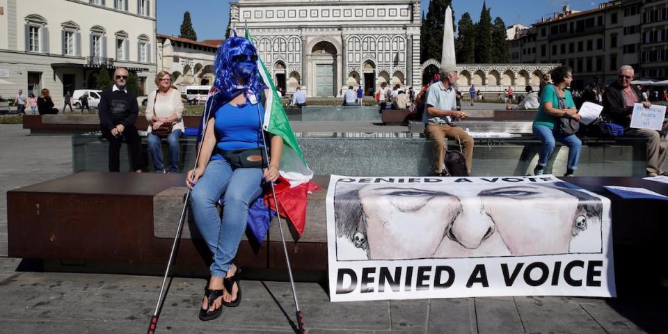 Protester against May in Florence