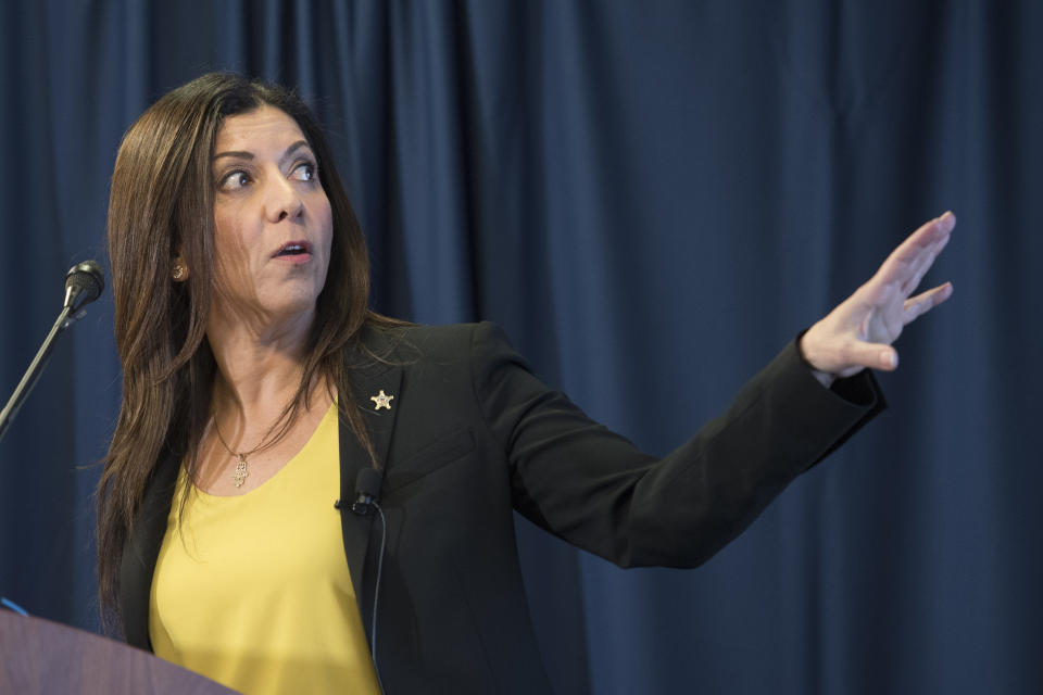 National Threat Assessment Center's Chief Lina Alathari announces the release of the Secret Service National Threat Assessment Center's Protecting America's Schools report, in Washington, Thursday, Nov. 7, 2019. The report examines 41-targeted attacks that occurred in schools between 2008 and 2017. (AP Photo/Cliff Owen)