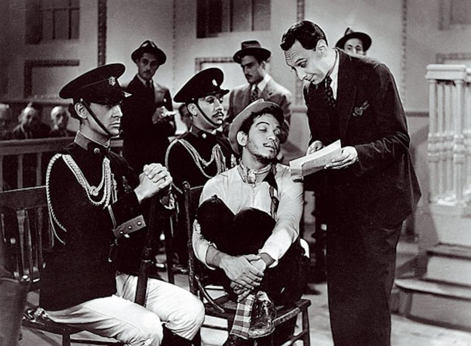 Fotograma de la escena de juicio en <em>Ahí está el detalle</em>, de 1940. <a href="https://www.imdb.com/title/tt0032186/?ref_=tt_mv_close" rel="nofollow noopener" target="_blank" data-ylk="slk:IMDB;elm:context_link;itc:0;sec:content-canvas" class="link ">IMDB</a>