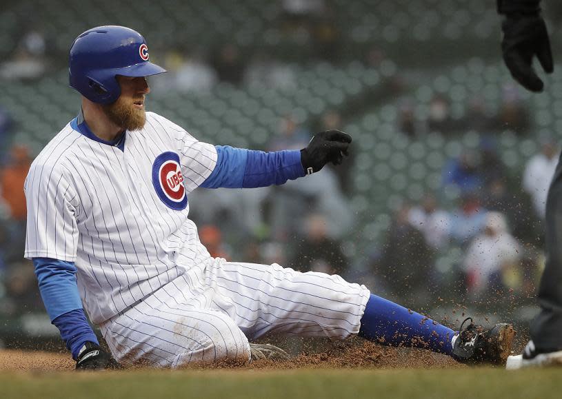 Ben Zobrist has been wearing these custom cleats at home games for two years. Now MLB says they have to go. (AP)