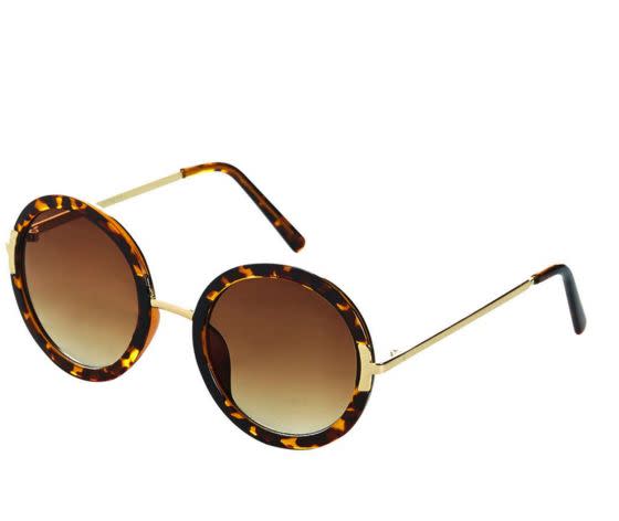 <a href="http://us.topshop.com/en/tsus/product/bags-accessories-1702229/sunglasses-70523/lolita-60s-round-sunglasses-4024929?bi=0&amp;ps=20" target="_blank">Lolita '60s Round Sunglasses, $10</a>