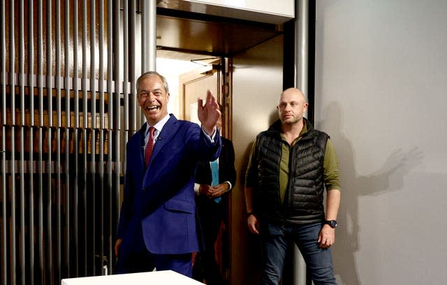 Reform UK leader Nigel Farage arrives for a press conference in Westminster, central London. 