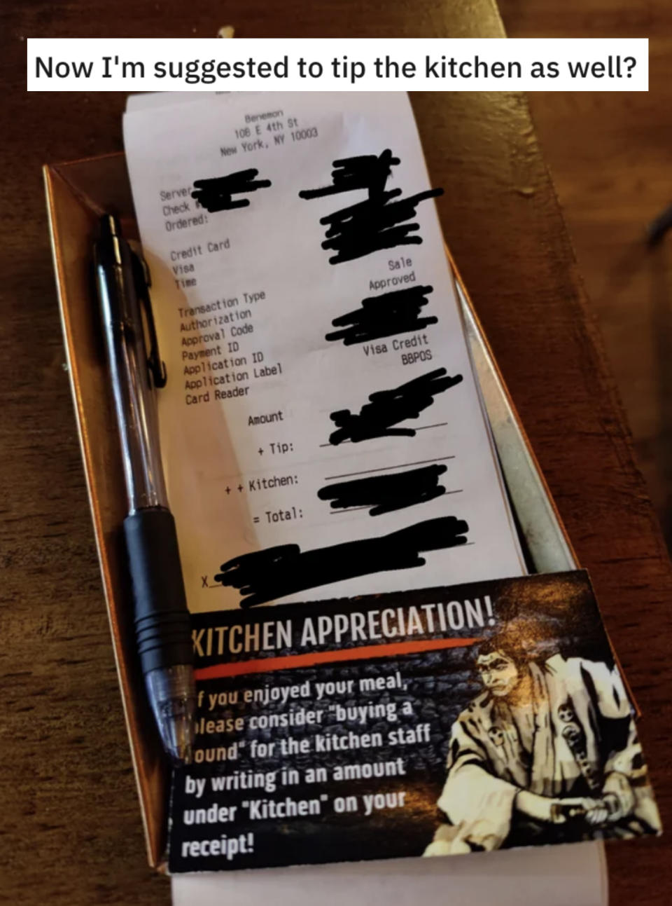 along with the bill, there's a post-card sized reminder that you can tip the kitchen as well