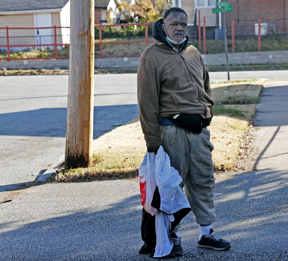 A former resident of Northview Village nursing home walks in an alley just north of Kingshighway Boulevard and Natural Bridge Avenue on Tuesday, Dec. 19, 2023, four days after the nursing home abruptly closed. On Jan. 3, 2024, a St. Louis Police detective identified the man as Frederick Caruthers, and said authorities have been unable to find him. (Laurie Skrivan/St. Louis Post-Dispatch via AP)