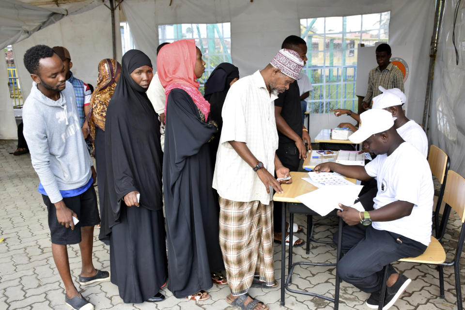 Locals line up to cast their votes, in Zanzibar, Tanzania, Wednesday. Oct.28, 2020. Tanzania's other top opposition party, ACT Wazalendo, accused police of shooting dead nine people in the semi-autonomous region of Zanzibar. (AP Photo)