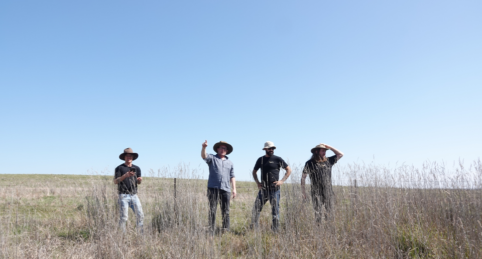 Ted Stein, Tim McGrath, George Madani and Chad Beranek in a paddock in Bathurst.