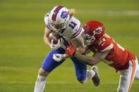 Buffalo Bills wide receiver Cole Beasley (11) is tackled by Kansas City Chiefs cornerback Bashaud Breeland (21) after catching a pass during the second half of the AFC championship NFL football game, Sunday, Jan. 24, 2021, in Kansas City, Mo. (AP Photo/Charlie Riedel)