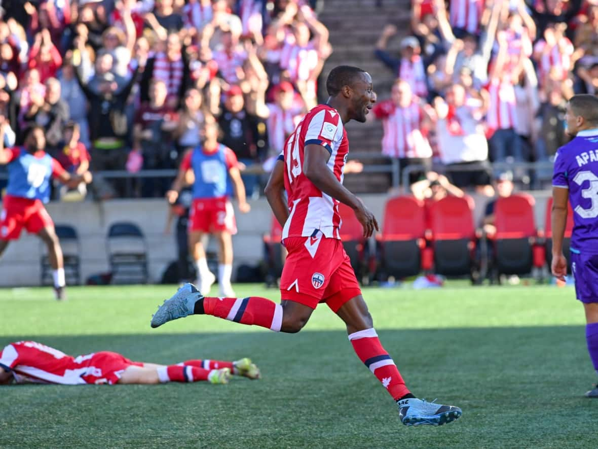 Atlético Ottawa fans celebrate Malcolm Shaw's goal in the 83rd minute of a 1-1 draw against Pacific FC on Oct. 23 in the Canadian Premier League semifinals.  (Matt Zambonin/Freestyle Photography - image credit)