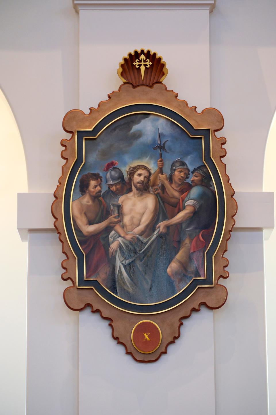 The 10th Station of the Cross, depicting Jesus being stripped of his garments, is shown at Sacred Heart Church at the Blessed Stanley Rother Shrine in Oklahoma City.