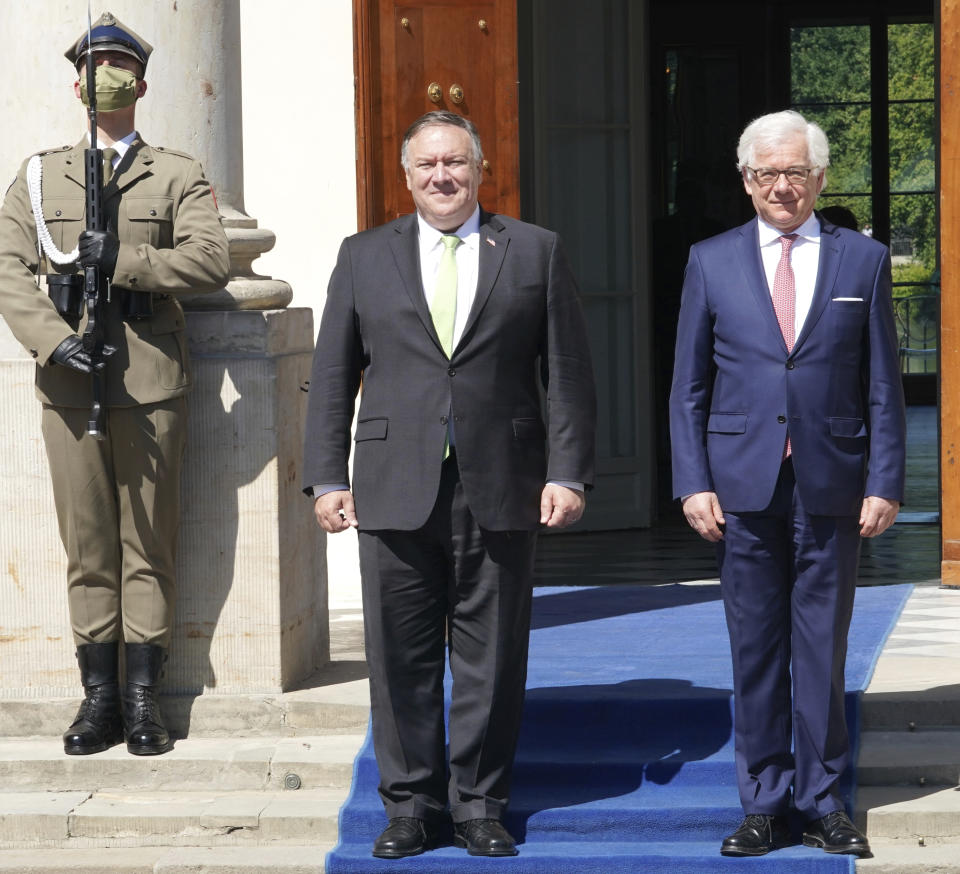 US Secretary of State Mike Pompeo, left, meets with Poland's Foreign Minister Jacek Czaputowicz in Lazienki Palace in Warsaw, Poland, Saturday Aug. 15, 2020. Pompeo is on a five day visit to central Europe. (Janek Skarzynski/Pool via AP)