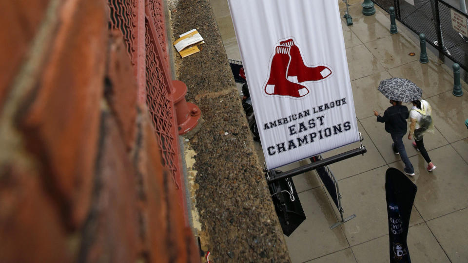 The Red Sox hung this banner outside Fenway Park after clinching last year’s American League East title. (AP)