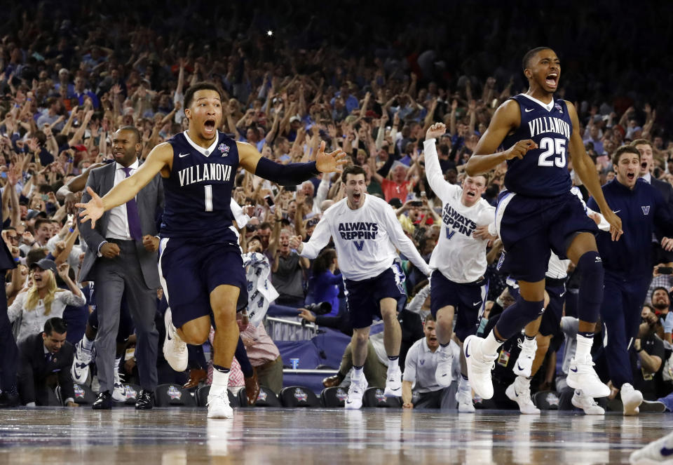 FILE - Villanova's Jalen Brunson (1), Mikal Bridges (25) and their teammates celebrate after the NCAA Final Four tournament college basketball championship game against North Carolina, Monday, April 4, 2016, in Houston. Villanova won 77-74. (AP Photo/David J. Phillip, File)