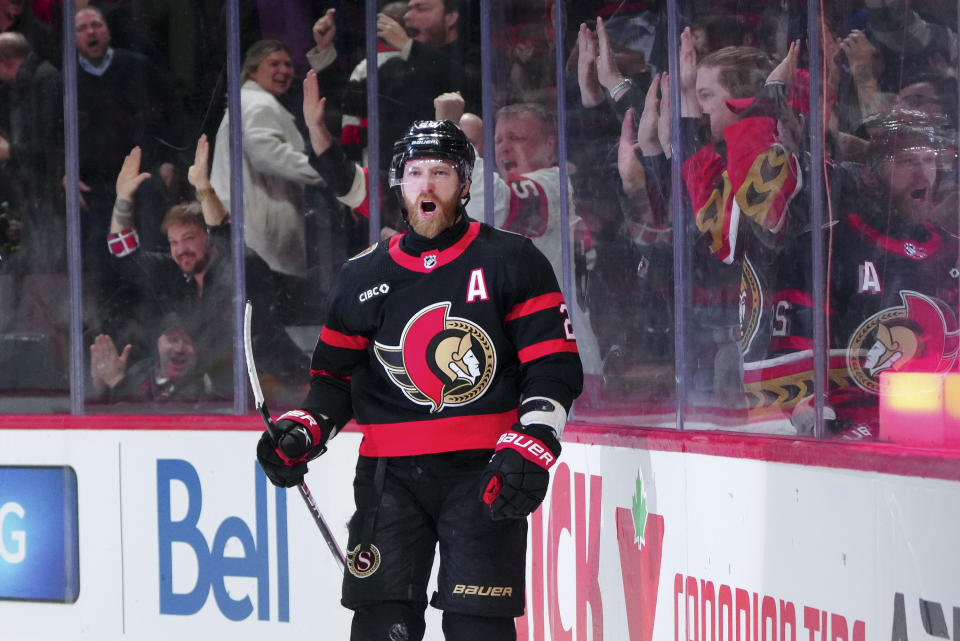 Ottawa Senators right wing Claude Giroux (28) celebrates his game-winning goal in overtime against the Nashville Predators during an NHL hockey game in Ottawa, Ontario, Monday, Jan. 29, 2024. (Sean Kilpatrick/The Canadian Press via AP)