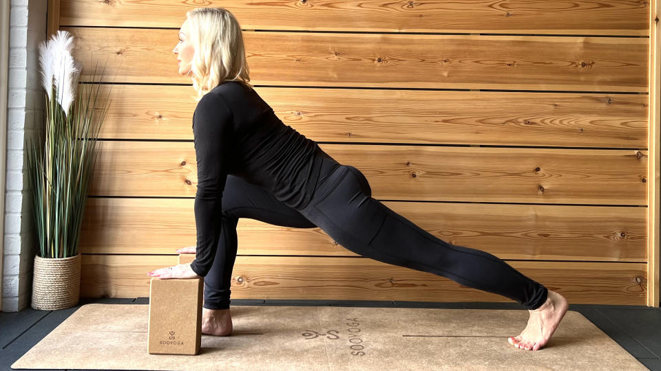 Kristina Rihanoff demonstrates assisted crescent lunge