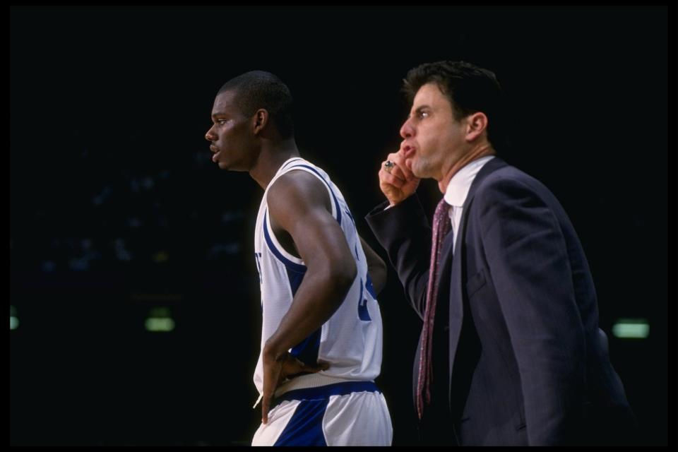 Mar 1993: Head coach Rick Pitino of the University of Kentucky gesticulates from the sidelines, with player Jamal Mashburn next to him, during the Wildcats game against the Indiana Hoosiers in the 1993 NCAA Final Four tournament. Mandatory Credit: Allspo