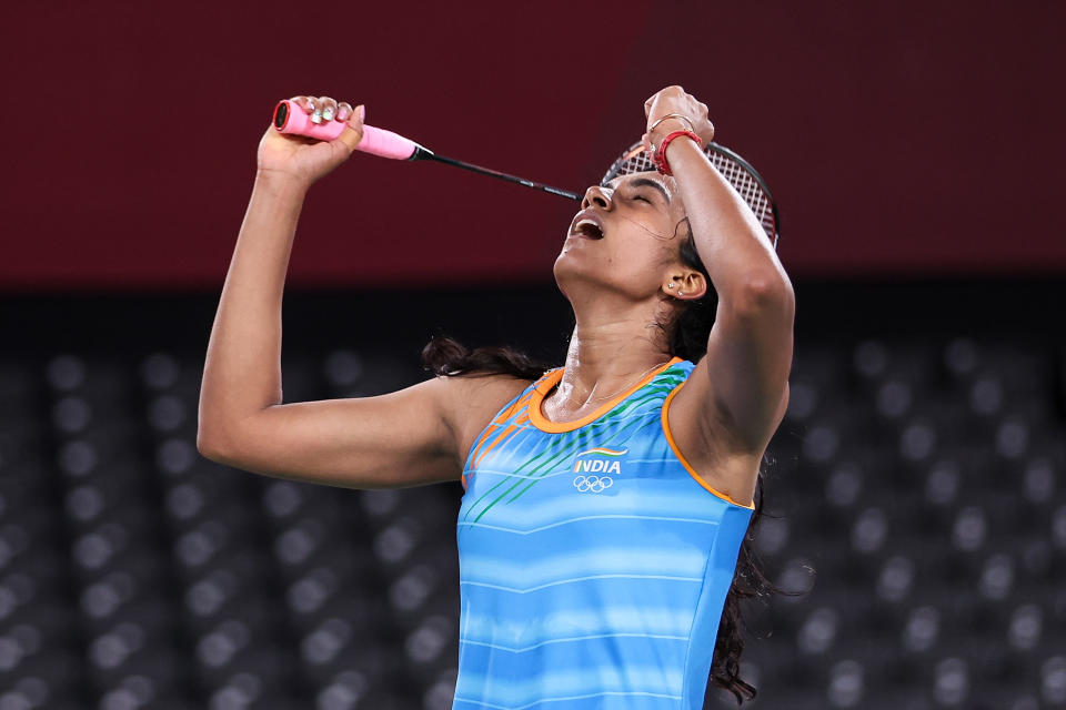 CHOFU, JAPAN - AUGUST 01: Pusarla V. Sindhu of Team India celebrates as she wins against He Bing Jiao of Team China during the Women’s Singles Bronze Medal match on day nine of the Tokyo 2020 Olympic Games at Musashino Forest Sport Plaza on August 01, 2021 in Chofu, Tokyo, Japan. (Photo by Lintao Zhang/Getty Images)