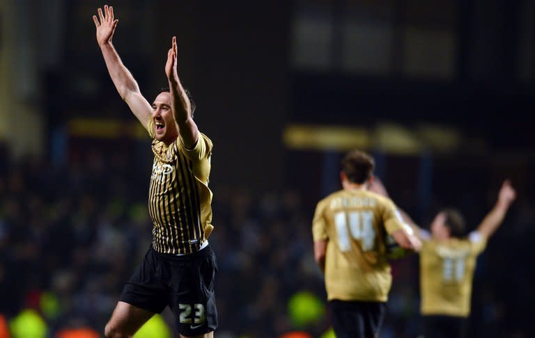 Rory McArdle celebrates at Aston Villa on January 22, 2013 after Bradford City held on for a 4-3 aggregate win to reach the League Cup final. The League Two outfit entered the tournament as 10,000-1 outsiders