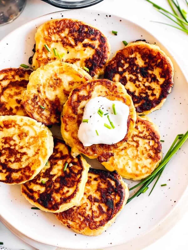 <p>Savory Nothings</p><p>Try this easy recipe for leftover mashed potato pancakes with cheese! Made with four simple ingredients and ready in just 15 minutes, they make the best quick meal or appetizer.</p><p><strong>Get the recipe: <a href="https://www.savorynothings.com/leftover-mashed-potato-cakes/" rel="nofollow noopener" target="_blank" data-ylk="slk:Leftover Mashed Potato Pancakes;elm:context_link;itc:0;sec:content-canvas" class="link rapid-noclick-resp">Leftover Mashed Potato Pancakes</a></strong></p>