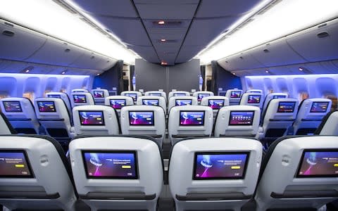 There will now be four seats in the middle row of World Traveller  - Credit: Nick Morrish British Airways