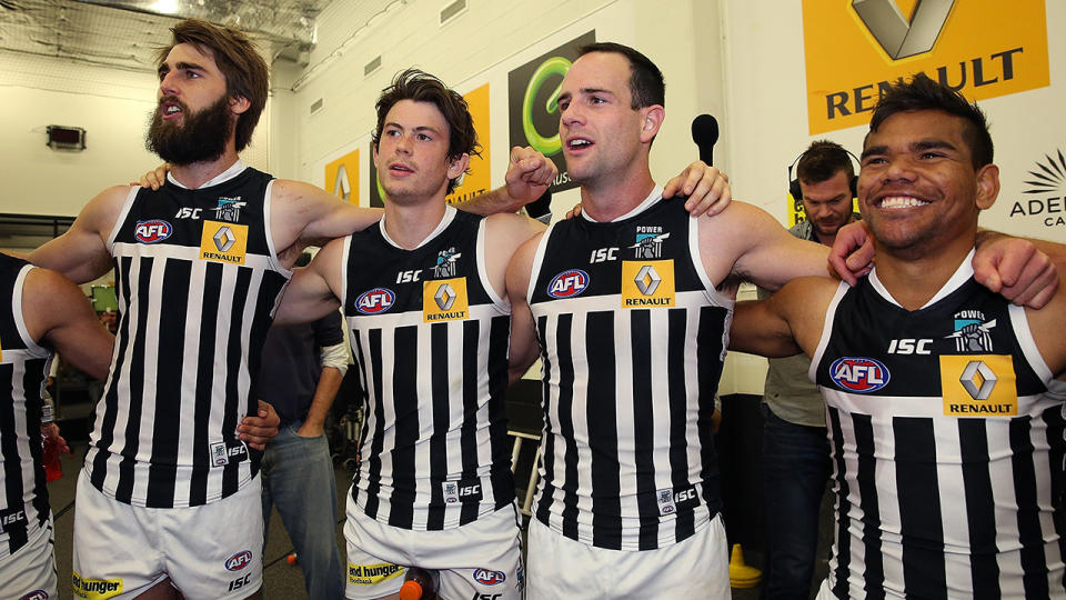 Port Adelaide, pictured here wearing the prison bars guernsey for their Elimination Final in 2014.